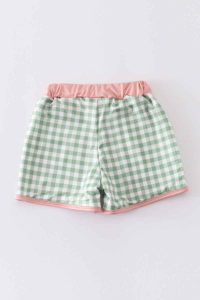 Green plaid boy swim trunks